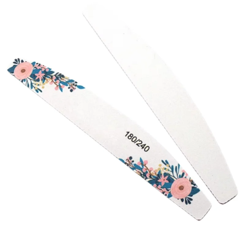 

Набор специализированных инструментов для маникюра: пилки для обрезки, придания формы, шлифовки и полировки ногтей с принтом цветов и листьев, а также губка для шлифовки.