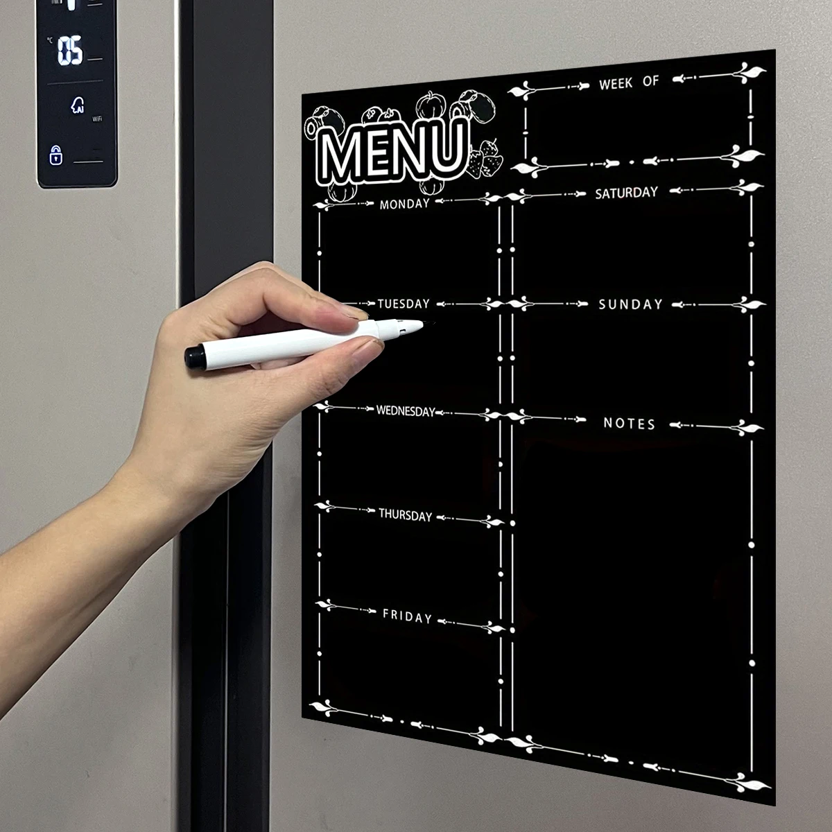 A magnetic refrigerator sticker with erasable soft whiteboard to prepare a weekly schedule for forgetting things