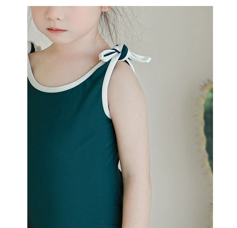 

Girls Ins Bow Suspender One Piece Swimsuit 2025 Baby Girl Swimsuit Princess Beach Swimsuit