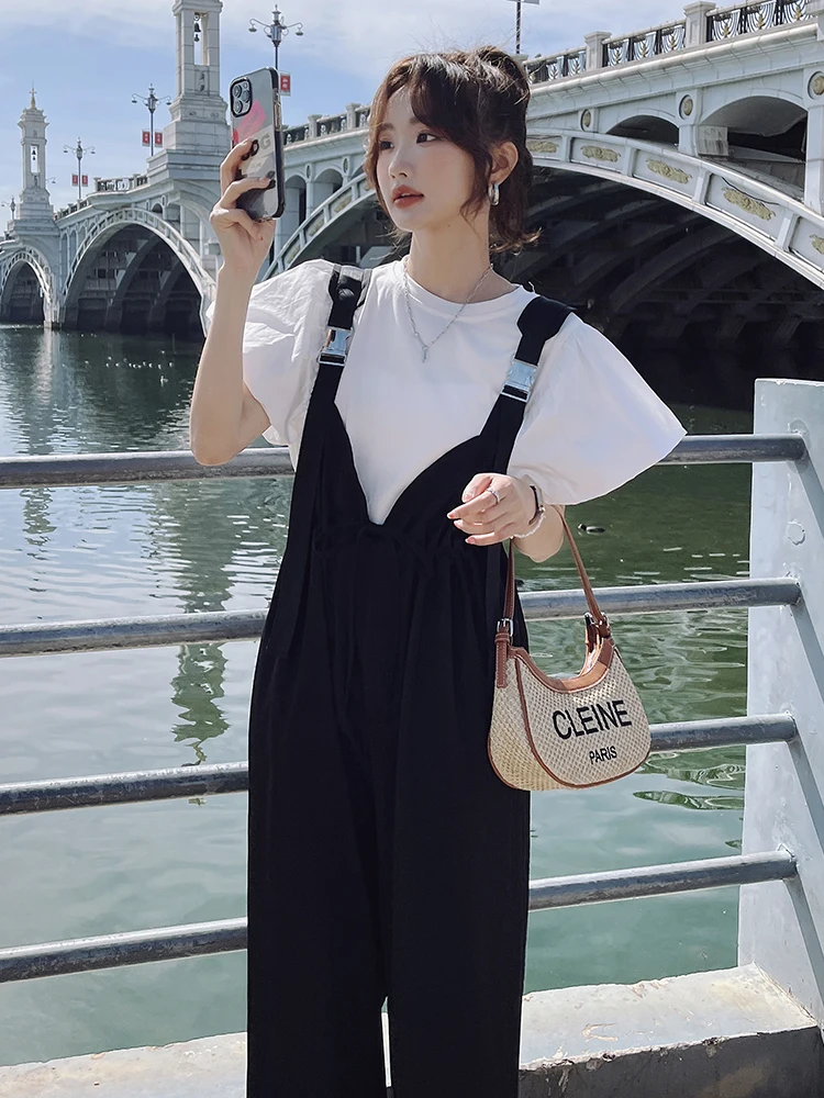 طقم جمبسوت نسائي عالي الخصر وواسع الساق مكون من قطعتين لصيف 2025 تي شيرت كوري جديد فضفاض مع لوتس لو سويس