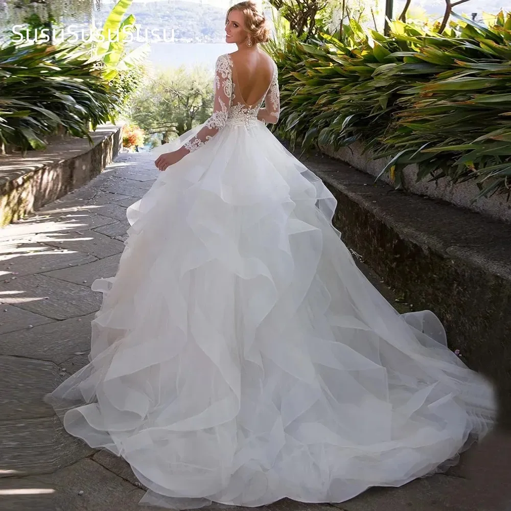 2023 Princess Ball Gown Wedding Dresses with Long Sleeves Lace Appliques Bridal Gowns Backless Ruffles Skirt Vestidos De Noiva