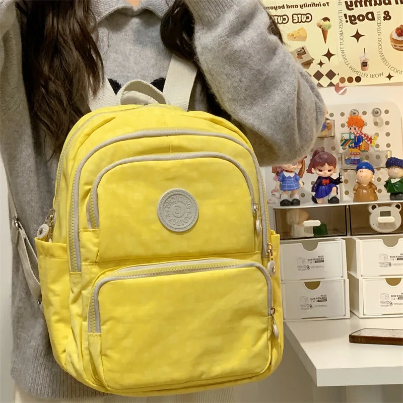 Minimalist Bright Yellow Backpack For Women Durable Casual Rucksack With Multi-Pocket Detail