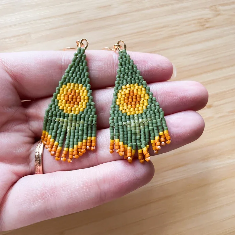 Rice bead earrings Sun Creativity Hand weaving Tassels Flowers Pattern Bohemia Alloy Female Fashion Simple Beaded earrings