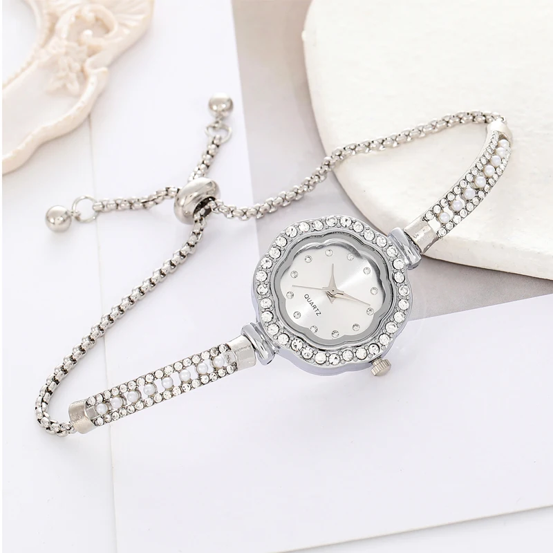 

1pcs Floral Colorful Dial Fashion Small Light Luxury Pearl Strap Women's Watch Features Pulling Bracelet