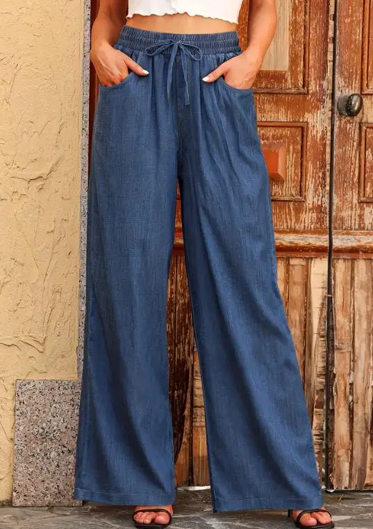 Luźne damskie letnie spodnie w jednolitym kolorze, imitacja denimu, z wysokim stanem, sznurowane, codzienne spodnie z szerokimi nogawkami, odpowiednie do codziennych dojazdów do pracy.