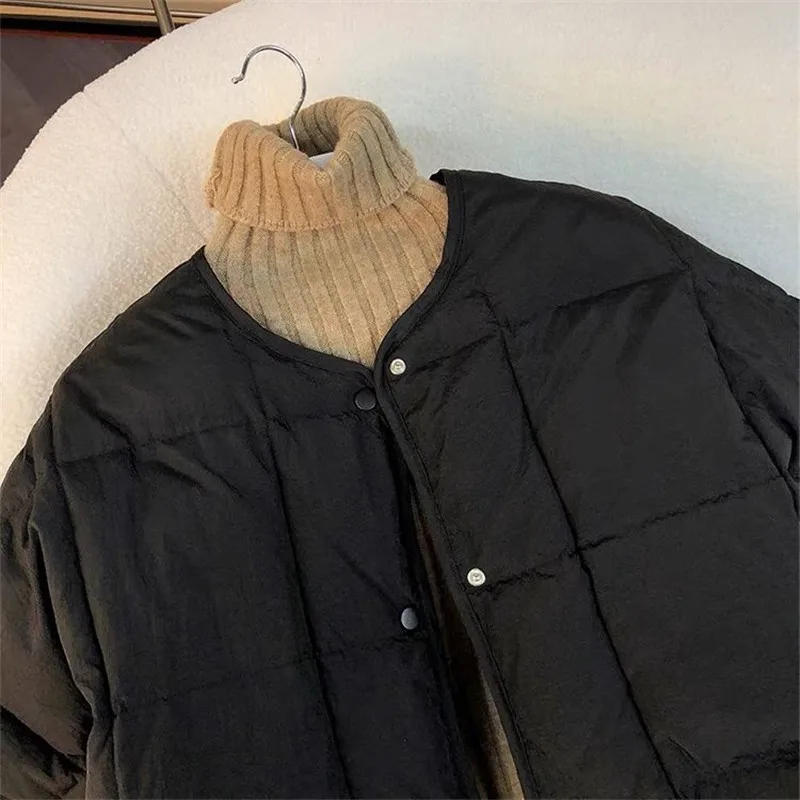 صدرية كلاسيكية للنساء لخريف وشتاء موضة جديدة سترة بأكمام قصيرة ورقبة على شكل حرف v إضافة سترة قطنية ملابس علوية فضفاضة غير رسمية للسيدات