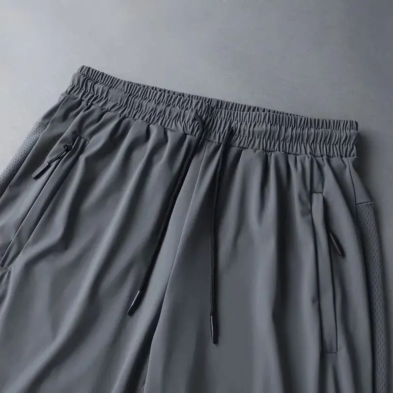 

Ice Silk Casual orts Мужские летние тонкие спортивные брюки для бега с пятью точками свободного покроя молодежные брюки Pure Color со средней талией
