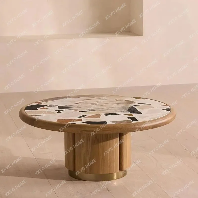 

Nordic high-end solid wood coffee table simple terrazzo round tea table living room designer