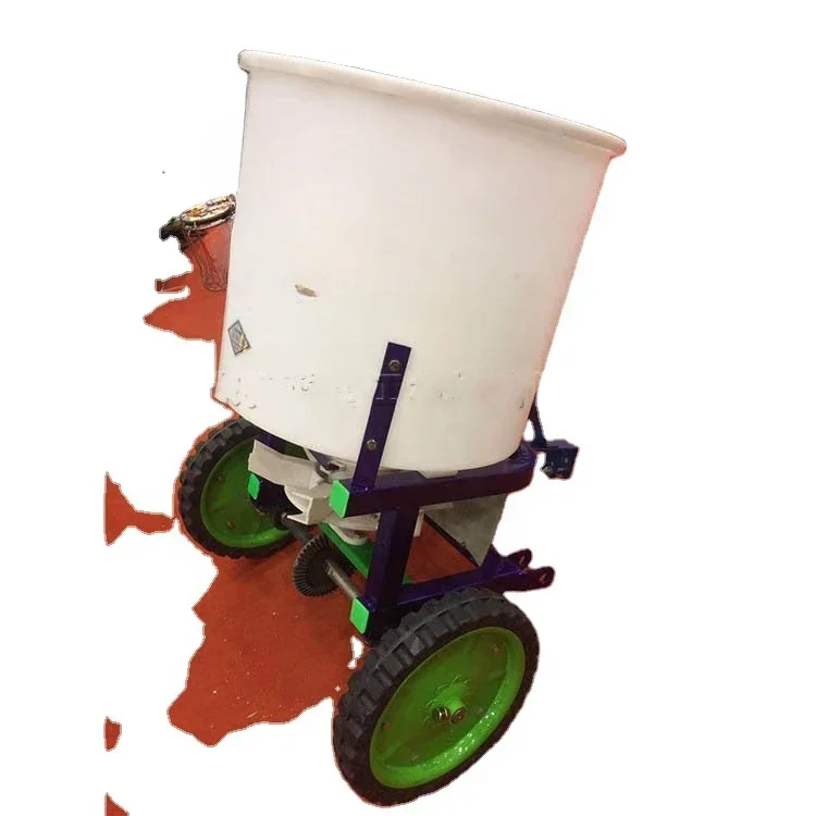 

Small agricultural fertilizer spreader, a basic tool for grass seeds and gardening