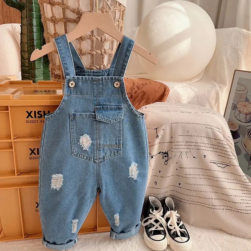 

Boys and Girls' Denim Strap Pants 2023 Baby Strap Pants Children's Spring and Autumn Fashionable Perforated Pants