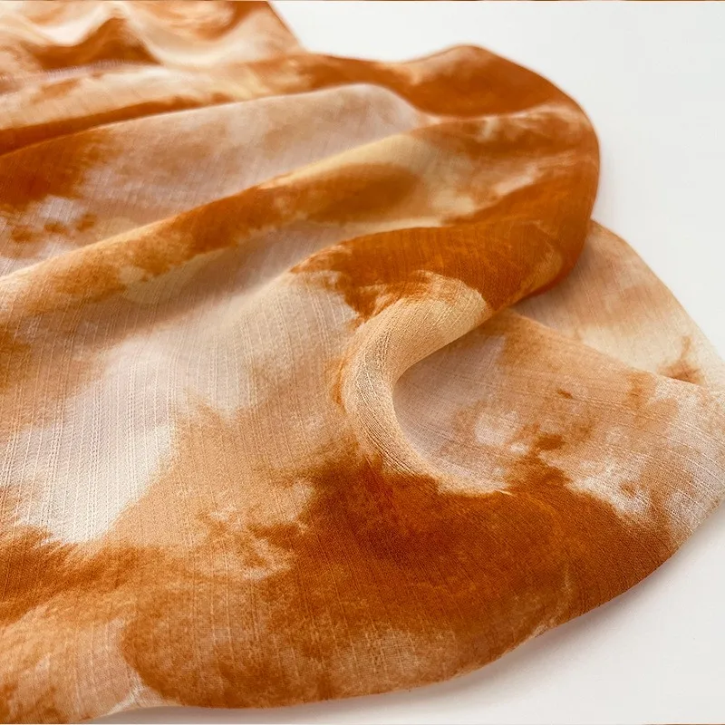 Sunset orange irregularly diffused and tie-dyed semi-transparent chiffon fabric for Hanfu cheongsam gauze skirts