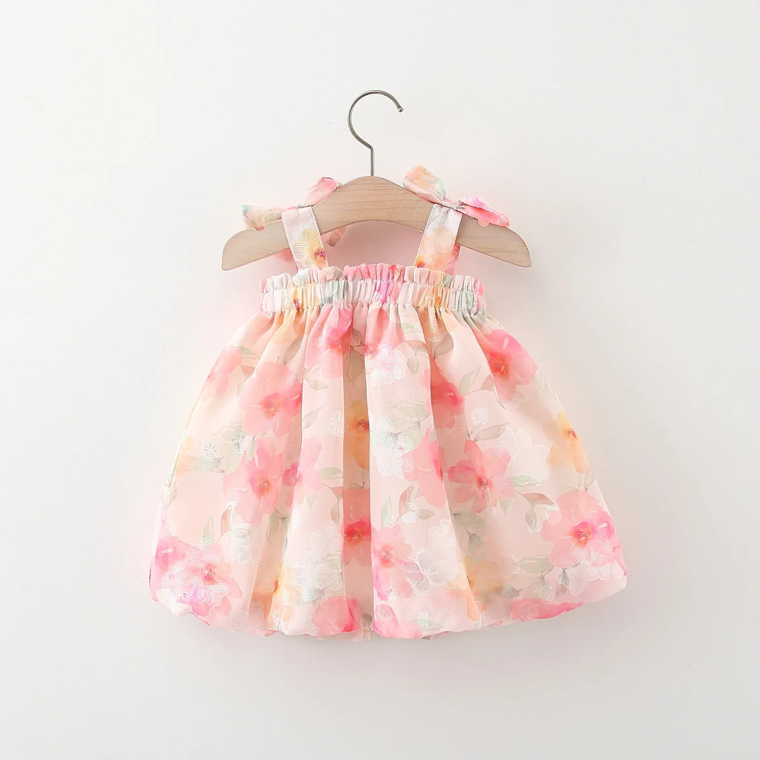 Summer children\'s dress baby girl covered in floral prints two bows and a princess dress with suspenders