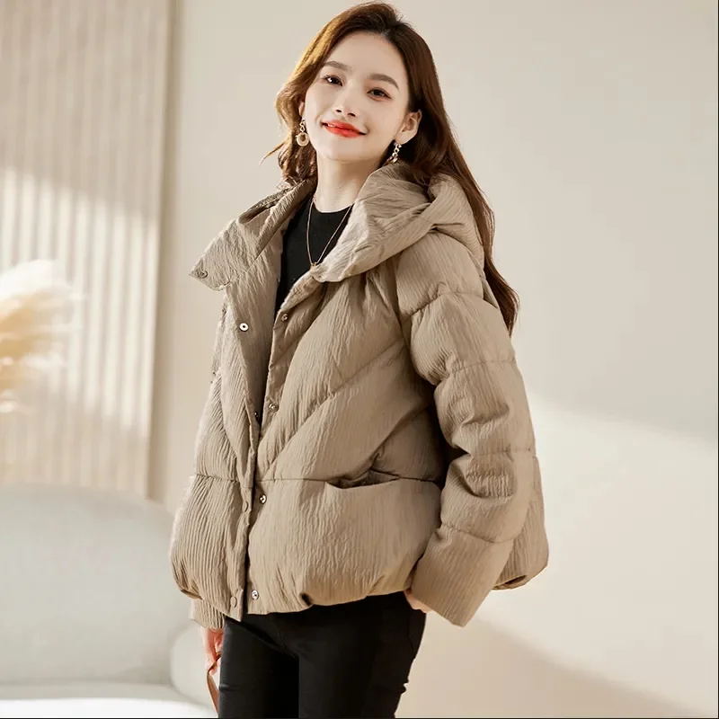 Piumino in cotone leggero con cappuccio Parka coreano da donna con cerniera invernale 2025 Nuovo cappotto caldo allentato e spesso alla moda Capispalla W1409