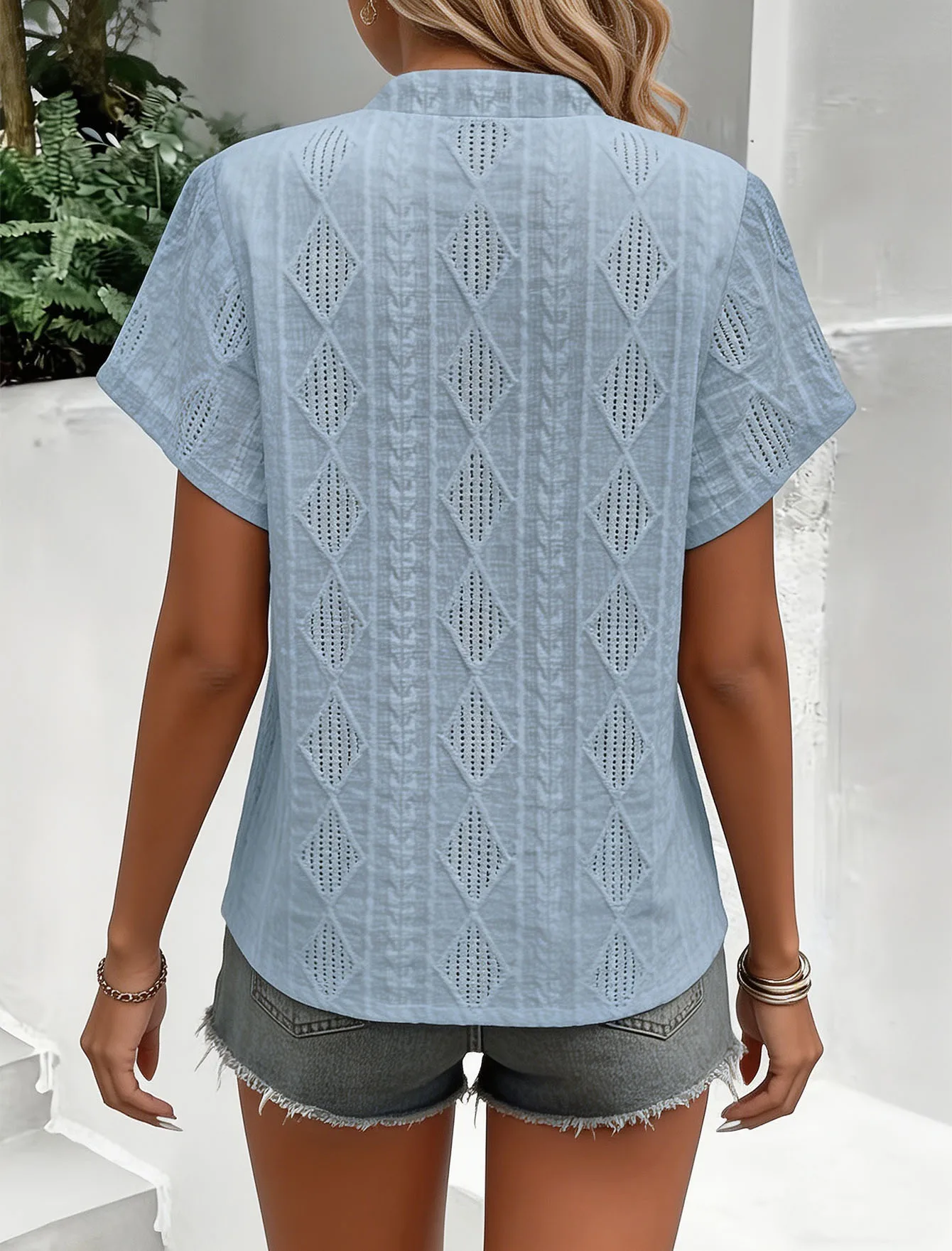 Spring and summer new round neck loose short sleeved T-shirt jacquard solid color top for women
