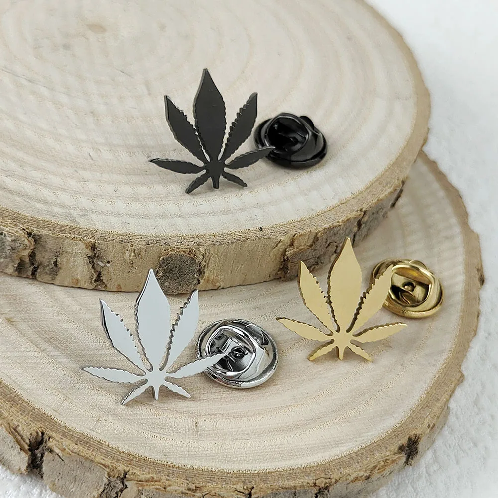 

Stainless steel leaf symbol men's brooch, flower bud symbol badge, niche clothing accessory badge