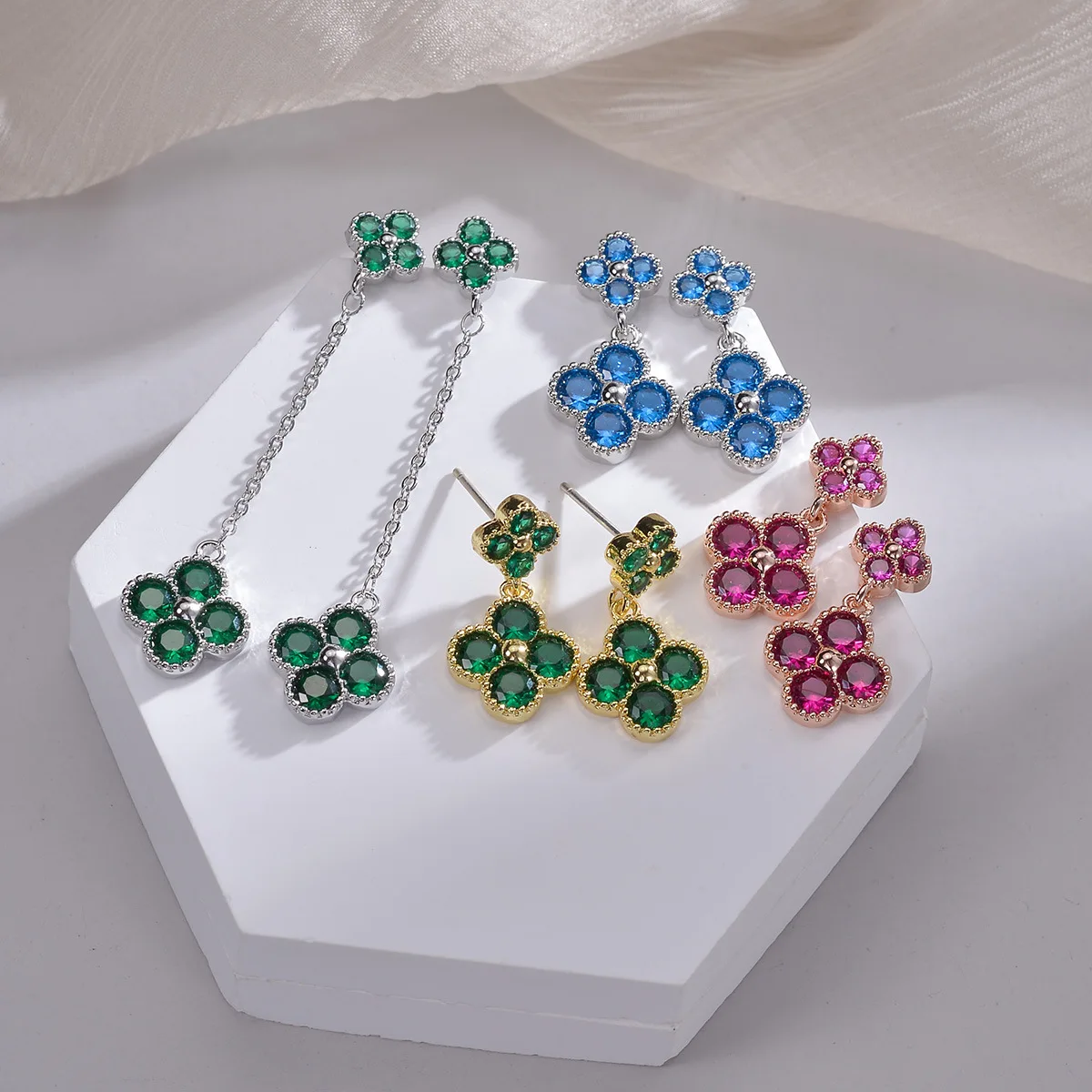 Whoelsale Korean Version 925 Silver Needle Four Leaf Grass Zircon Earrings Synthetic Ruby Green Nano Lucky Star Fashion Rose