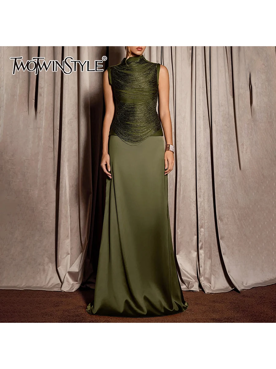 

TWOTWINSTYLE Patchwork Tassels Two Piece Sets for Women Stand Collar Sleeveless Top High Waist Long Skirt Solid Set Female 2026