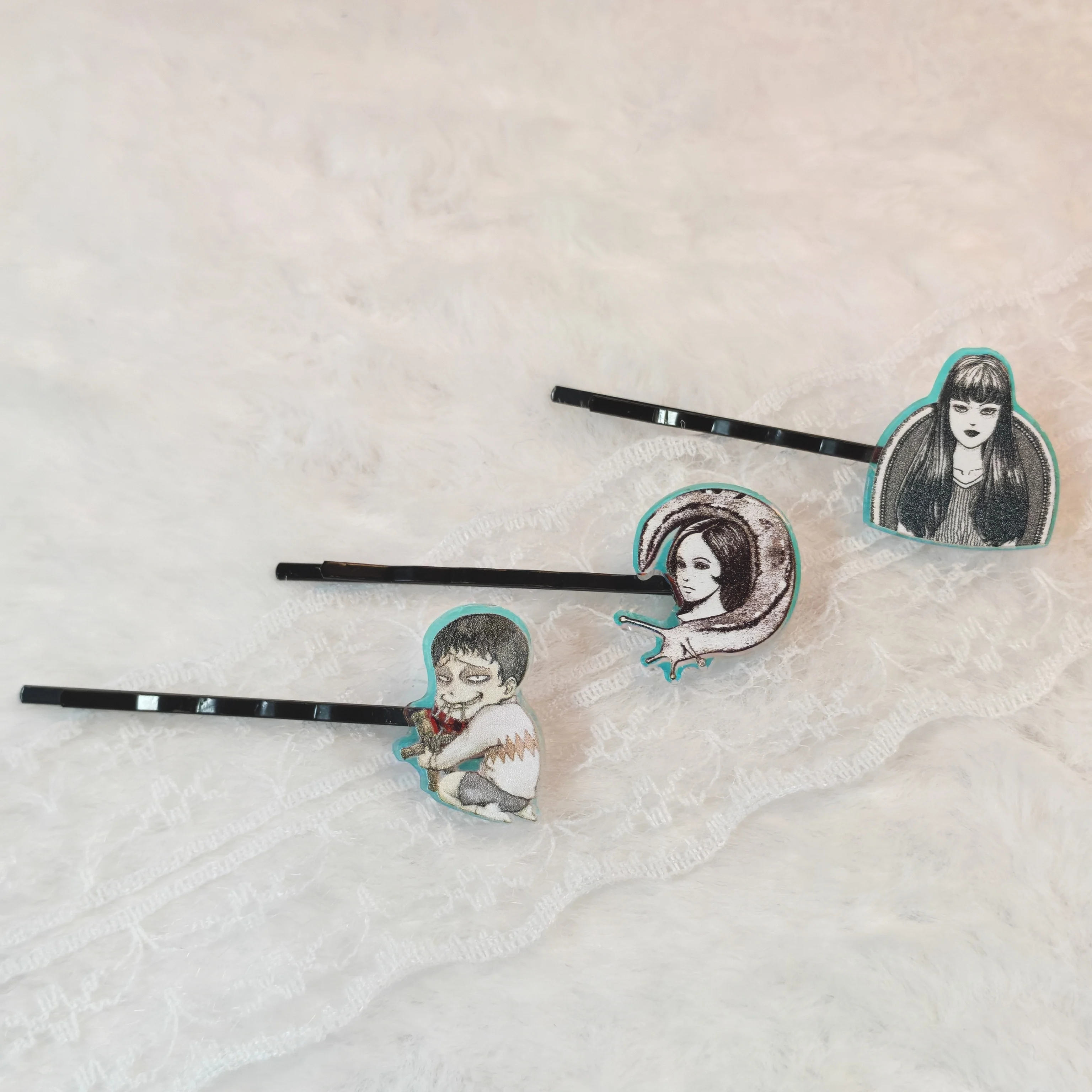 

Edgy Horror Manga Hairpins - Unique designs with gothic characters, perfect for adding a bold, creepy touch to hairstyles.