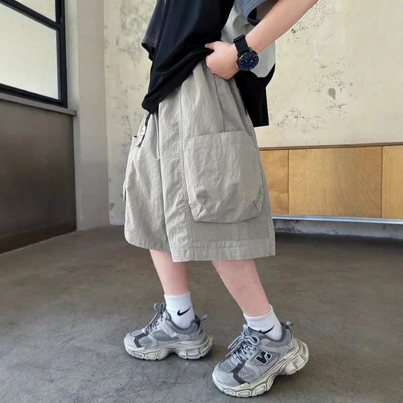 

2025 New Children's Summer Clothing Solid Color Cotton Pocket Decoration Breathable Work Shorts