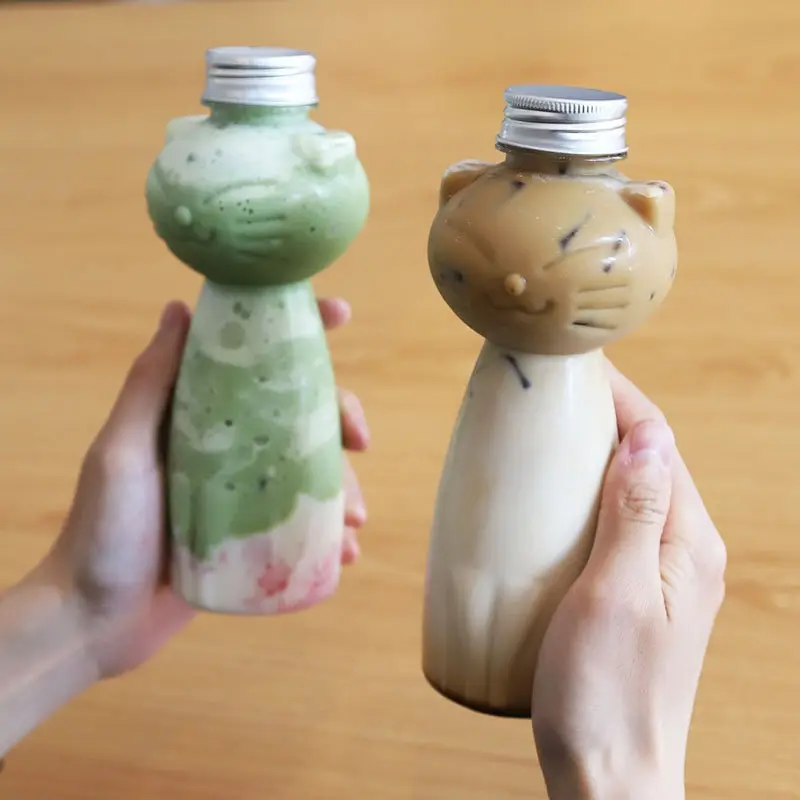 Botellas de jugo caseras transparentes, botella de PET para bebida fría, leche, té, zumo, tapa sellada, botella para gato