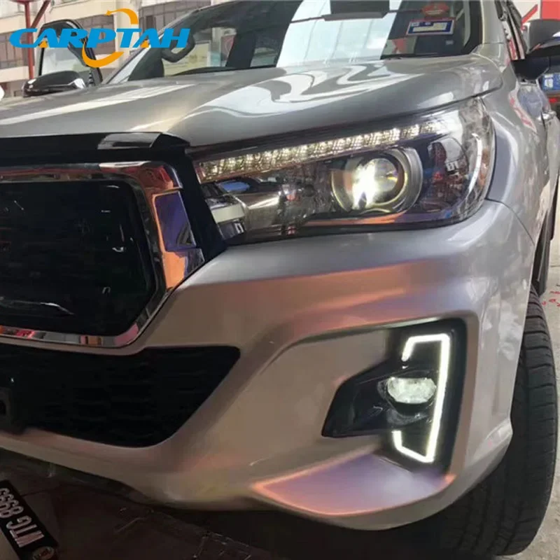 

Car LED 12V Daytime Running Headlamps For Toyota Hilux Revo Rocco 2018 2019 2020 Daylights Yellow Turn Signal DRL Car Foglamps