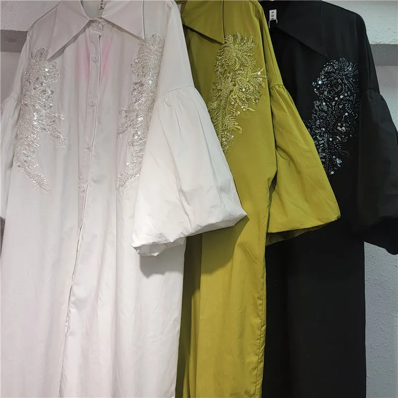 Sukienka damska na wczesną wiosnę 2026, luźna, patchworkowa, z koronkowym wykończeniem, sukienka koszulowa, długa sukienka, modna, odmładzająca, elegancka sukienka letnia.