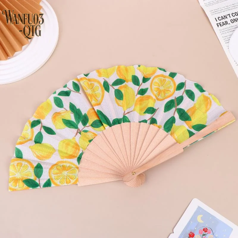 Hot 1Pcs Lemon Print Folding Hand Fan Fruit Pattern Bamboo Fabric Handheld Fan For Summer Cooling Dance Performance Party Decor