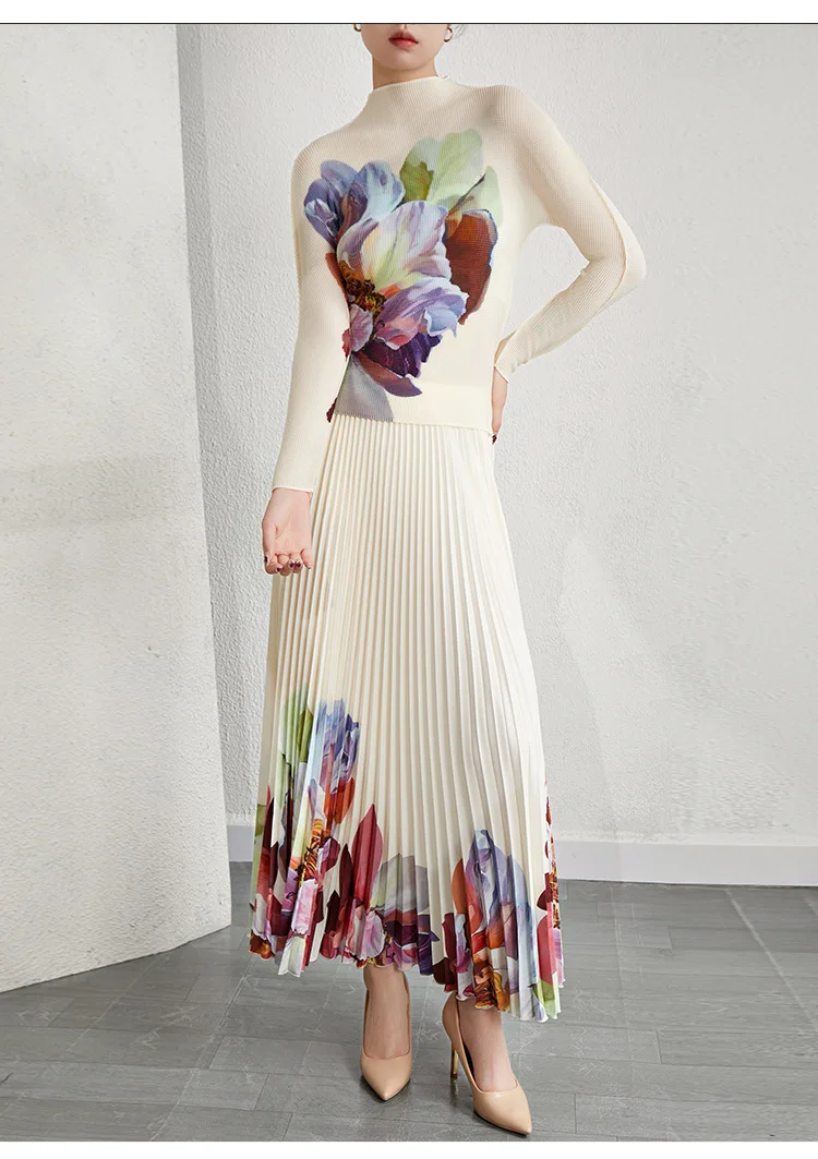 

Комплект из двух предметов: женский плиссированный пуловер с принтом, воротником-стойкой и длинными рукавами, а также юбка с цветочным узором для внешней торговли