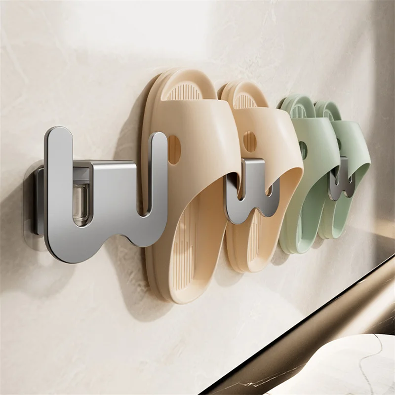 Estante de zapatillas autoadhesivo para baño, estante de drenaje de inodoro, gancho de almacenamiento de dormitorio montado en la pared, estante de secado de zapatos Simple