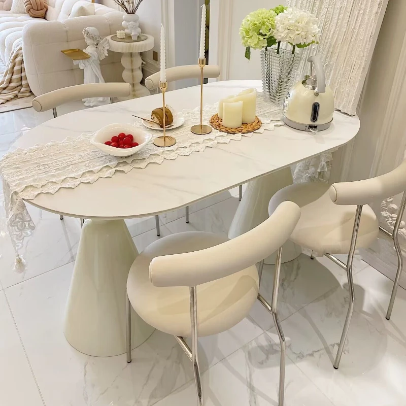 

Cream wind rock slab dining table and chairs, small apartment, modern simple light luxury, solid wood dining table, household