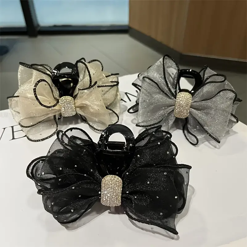 

Exquisite mesh butterfly hair claw accessory, elegantly designed, suitable for fashionable women - a hairstyle for daily use