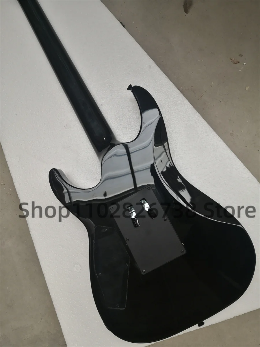 Clear black electric guitar Squilted Maple Top Maple neck Set In body Rosewood fingerboard 1000 inlaid tremolo bridge closed pic