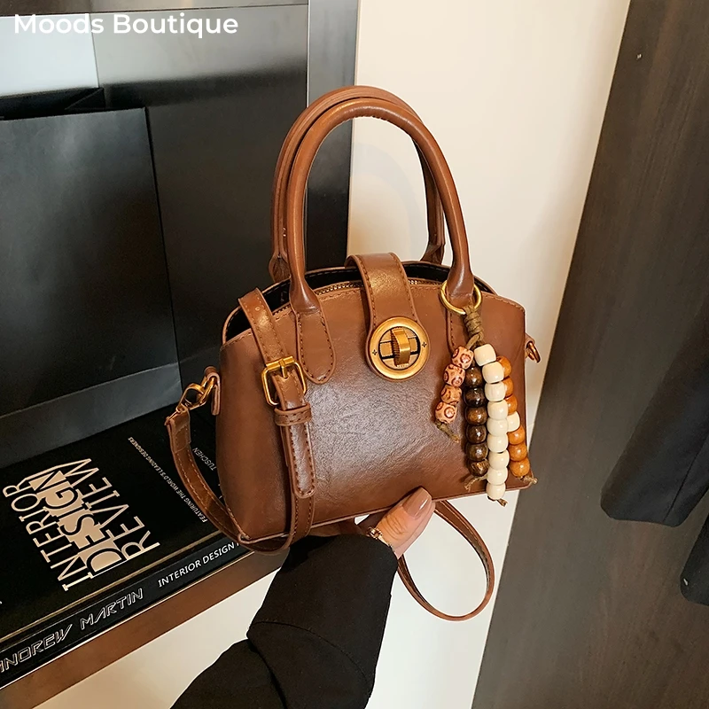 

Turn Lock Top-handle Shell Bags For Women 2026 Luxury Designer Purses And Handbags Commuter Shoulder Cross Body Bag With Pendant