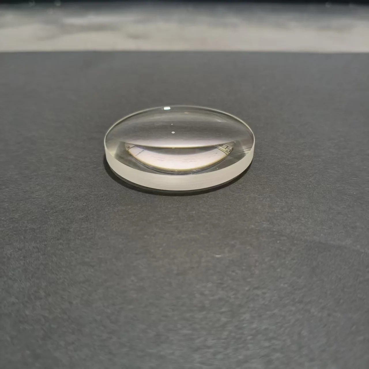 

Diameter 27mm, focal length 52mm, biconvex monolithic optical glass lens coated with 400~700nm part number R139