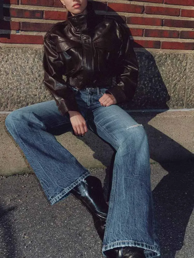 Stile europeo e americano autunno nuova moda abbigliamento da donna versatile giacca a maniche lunghe in similpelle lucida con colletto alla coreana