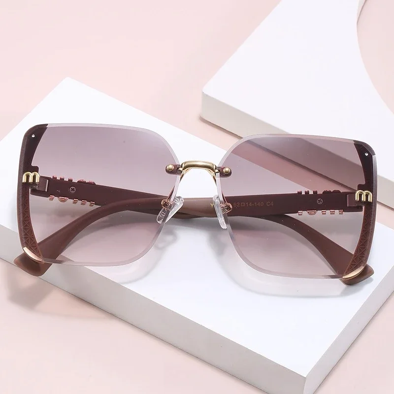 

‌2025 Square Frameless Sunglasses‌ - Trendy Oversized Letter Print UV400 Women's Fashion Shades