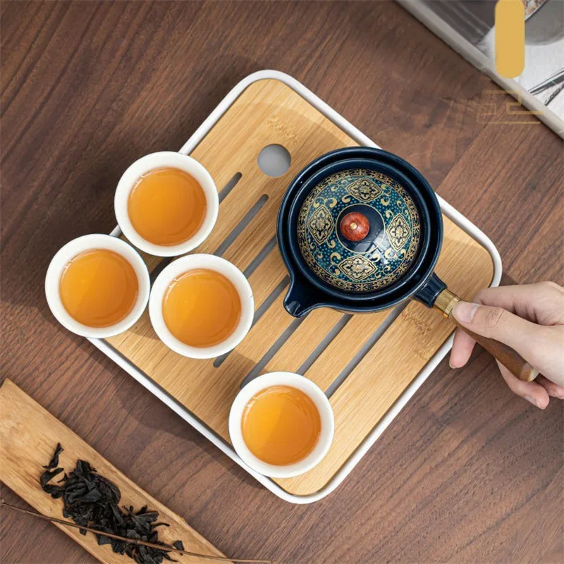Chinese Gongfu Porcelain Tea Set with 360° Rotation Tea Maker and Infuser Portable travel Tea Cup Teapot Set All in One Gift Bag