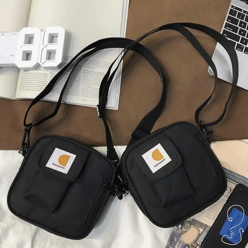 Bolso cruzado pequeño con correa de hombro ajustable para hombre y mujer, bolsa de mensajero de tela Oxford con cierre de cremallera, almacenamiento para teléfono y tienda