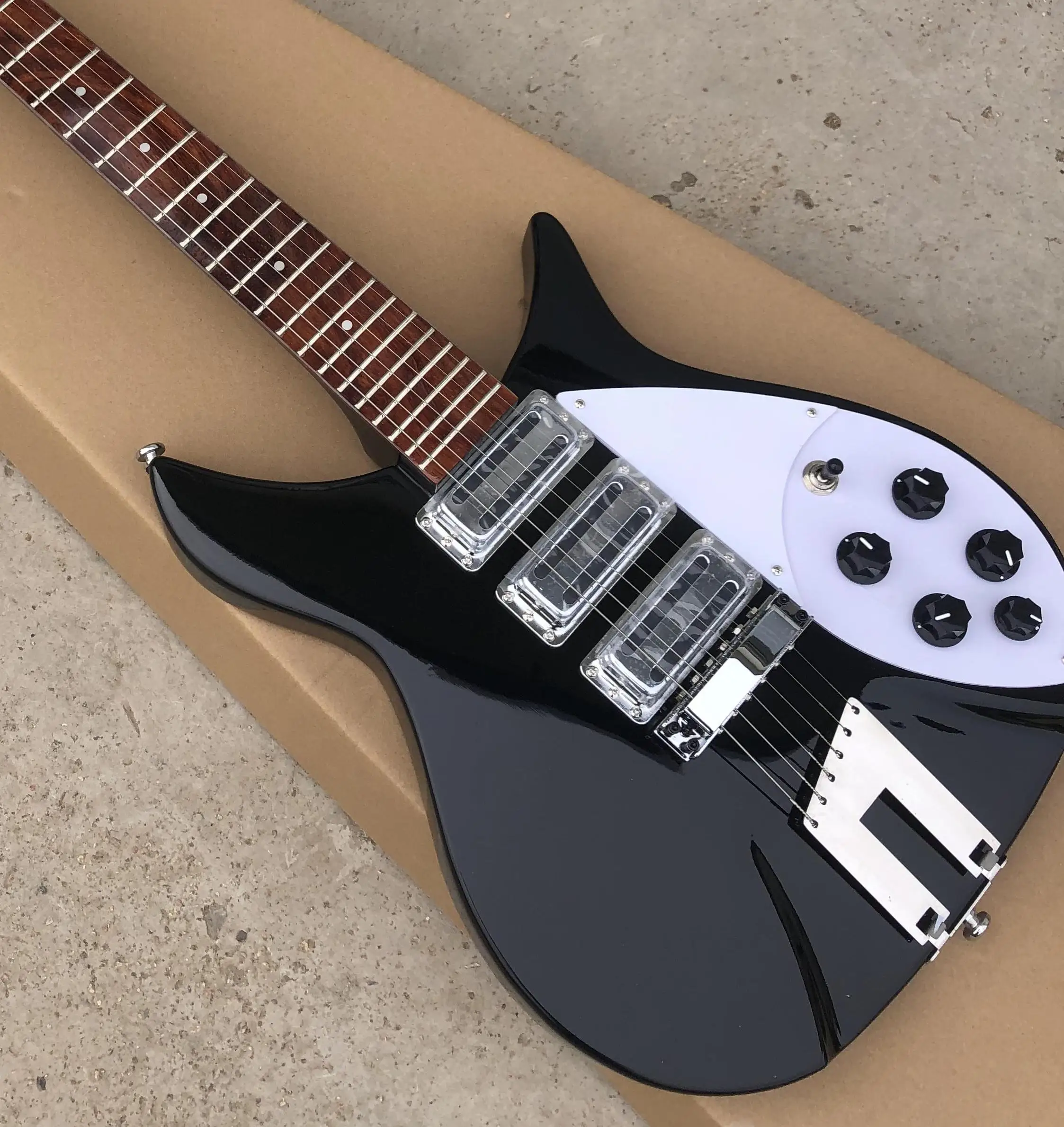 

black and white electric guitar Rosewood Fretboard, Fixed Bridge, Trapeze Tailpiece, Ricken backer 325,black electric guitar