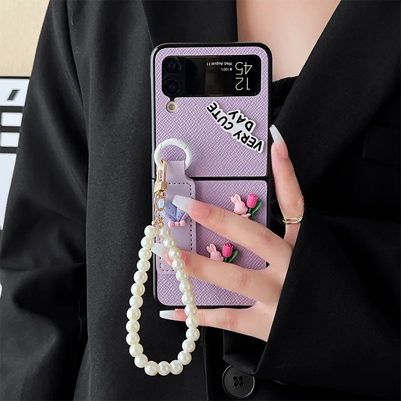 

Luxury Korean Fashion Rabbit Tulip Flower Bow Pearl Hand Chain Leather Phone Case For Samsung Galaxy Z Flip 3 4 5G Z Flip4 Flip3