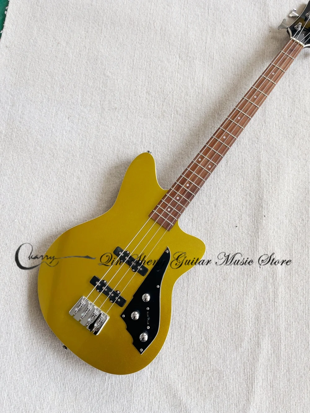 4 string gold guitar, Black dorsal side,thick bass bridge, solid wood body with maple neck, SS pickups, 20 frets, factory custom