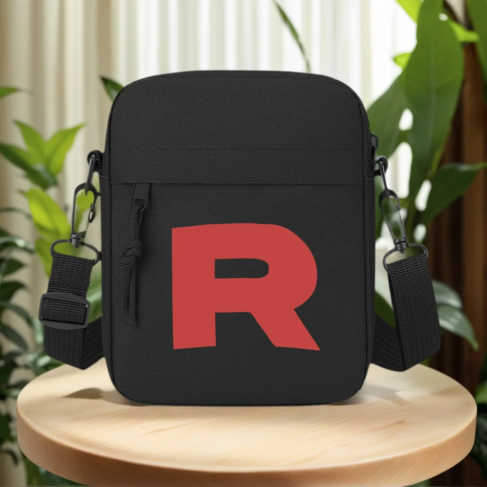 Red letter symbol on black background Men Crossbody Bag Single Shoulder Women Cartoon Anime Film Printing Design Unisex