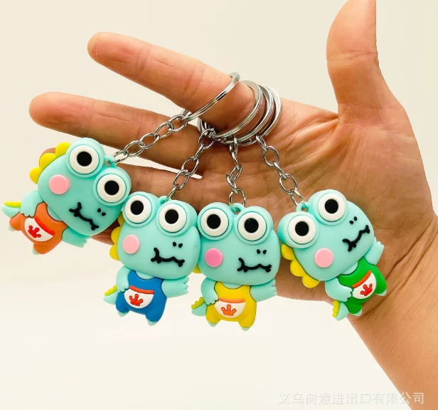 1PCS Cartoon dinosaur key chain doll bag pendant car key chain student gift. Random color