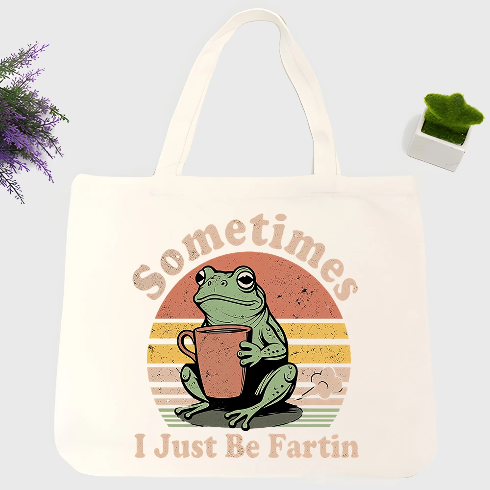 Men's frog graphic canvas tote bag with retro sunset design, perfect for casual daily use and weekend outings