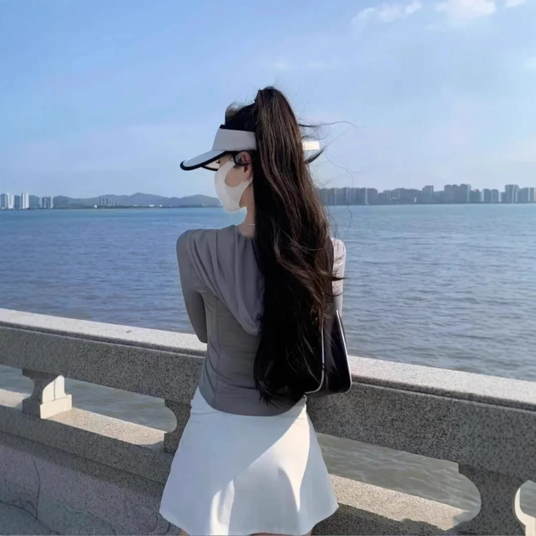 UPF50+ 2025 Chaqueta para el sol ajustada de seda helada para mujer, camisa resistente a los rayos UV para dar forma al cuerpo, ropa de playa transpirable refrescante, ropa para exteriores