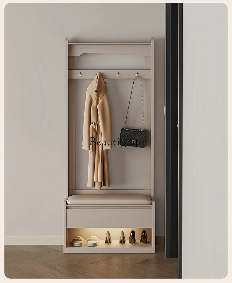 

Minimalist shoe change stool, integrated hanger, storage stool that can sit at the door of the home