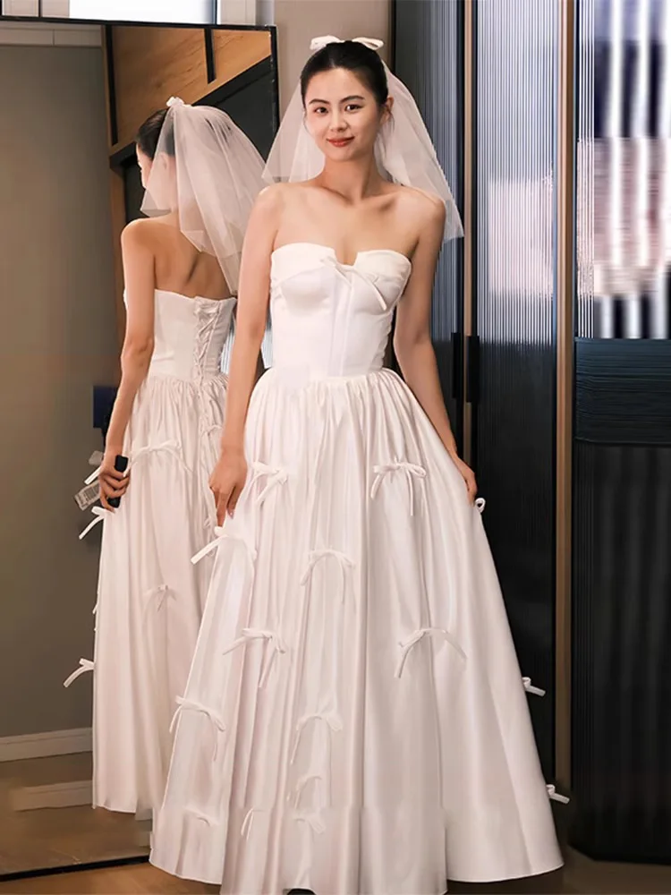 

French Bow Strapless Quinceanera Dresses White Satin A-line Homecoming Dress For Girls Backless Bandage Floor Length Prom Gown