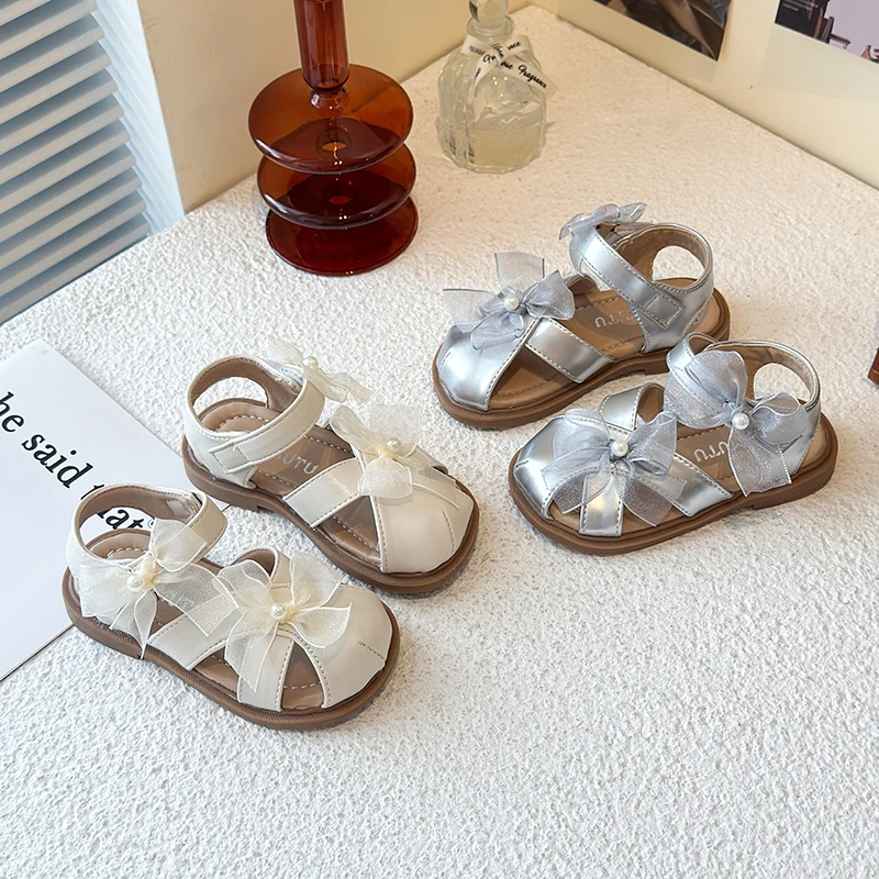 

2025 Summer Fashion New Princess Sandals Non-slip Soft Sole for Girls Mesh Butterfly Knot Toe-Covering Hollow Out Beach Shoes