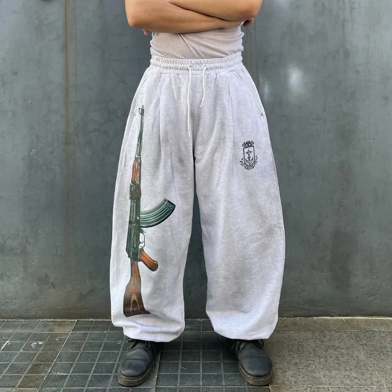 

A pair of dirty casual pants oversized retro power graphic men women hip hop streetwear Y2K Harajuku embroidered logo joggers