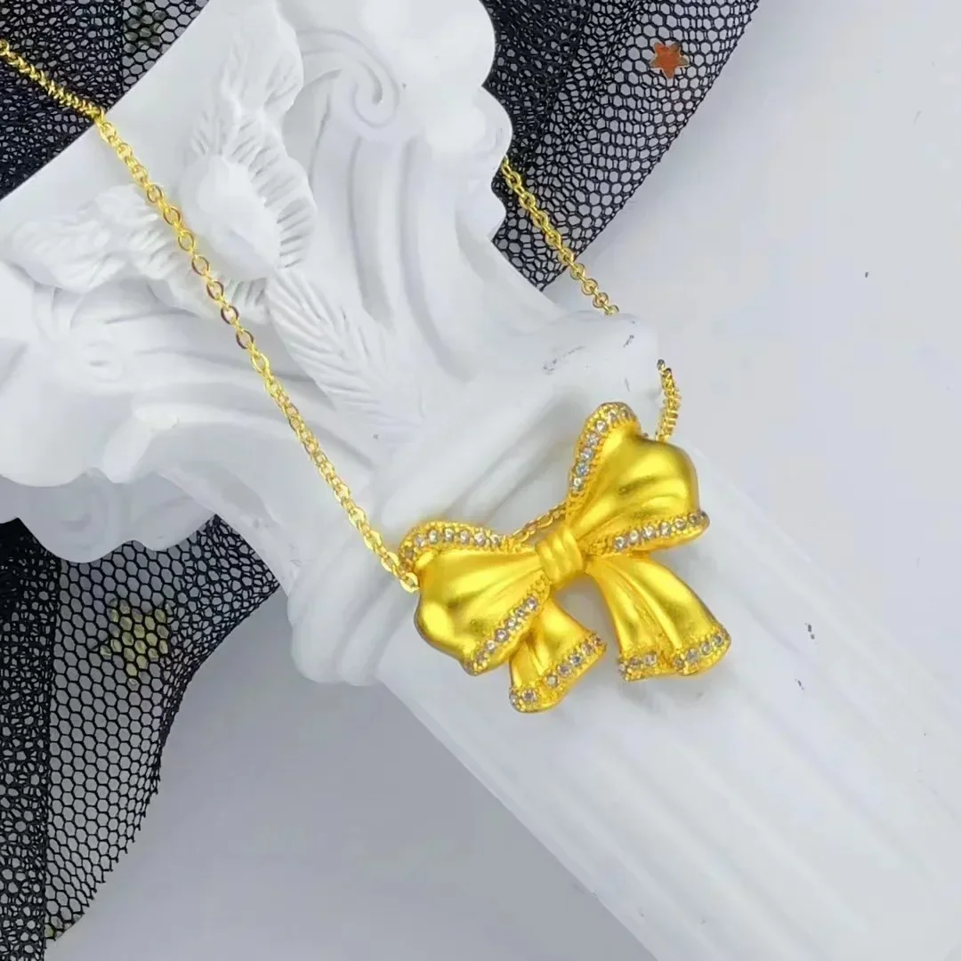 

9999 real gold 24K yellow gold Bow Pendant Women Niche Design Bow